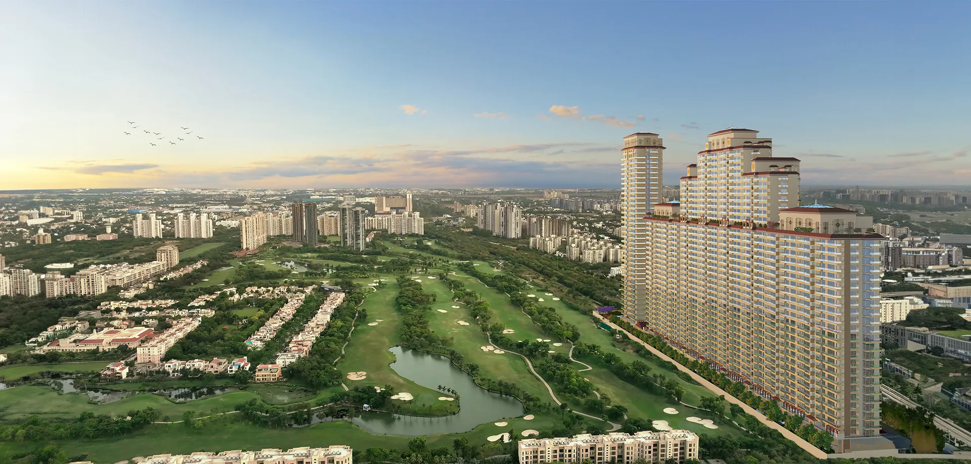 Aerial view of residential towers over a golf course